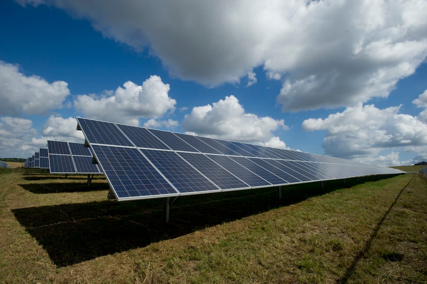 Solar panels on a modern residential rooftop at golden hour